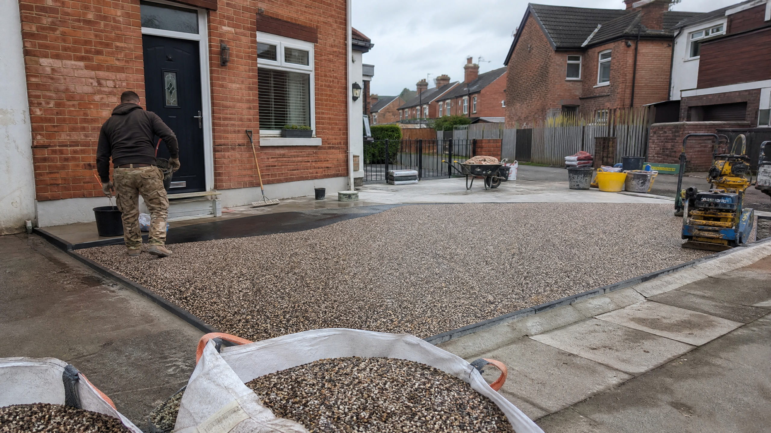 Resin Over Tarmac & Concrete in progress at a British residential property — professional service in Kettering