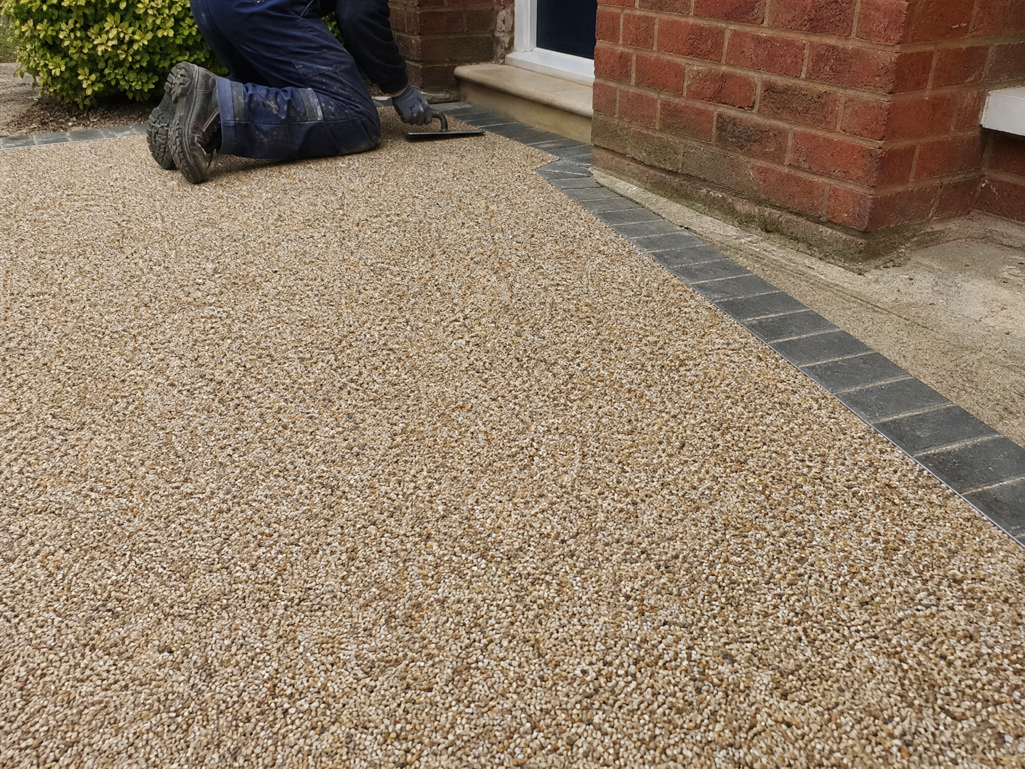 Close-up detail relevant to resin bound driveways — showing materials and installation technique